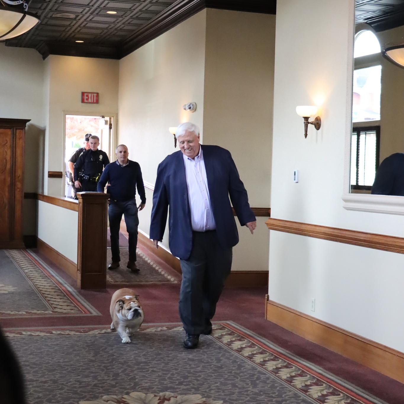 WV Governor Walking with his English Bulldog